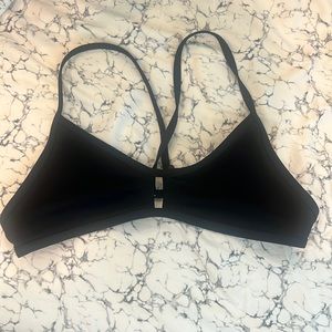 Jolyn Bennett 2 bikini top.